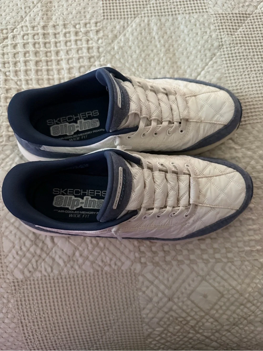 Skechers Women’s Cozy Fit Quilted Sneakers in White and Navy